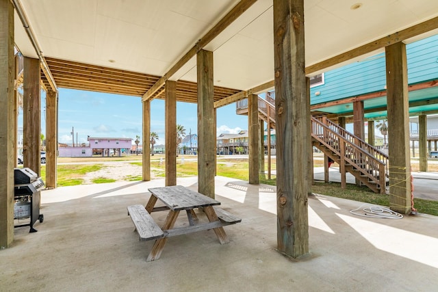 1214 Fort Velasco Dr, Surfside Beach, TX 77541 - view of patio / terrace with area for grilling and stairway
