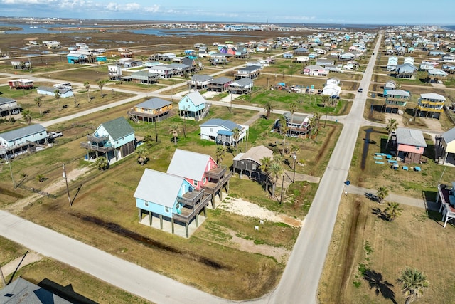 1214 Fort Velasco Dr, Surfside Beach, TX 77541 - aerial perspective of suburban area featuring a nearby body of water