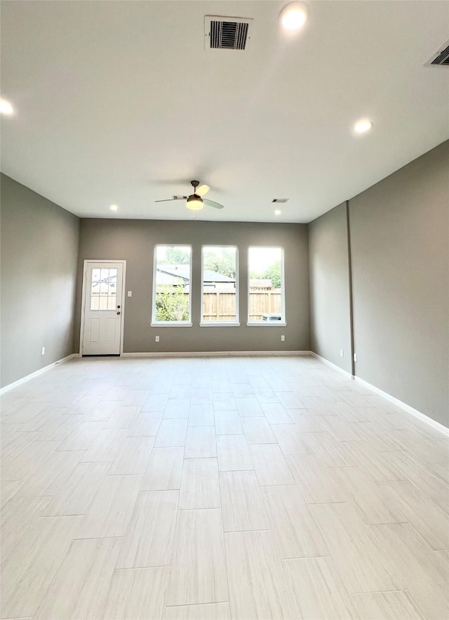 153 Treasure Dr, Houston, TX 77076 - unfurnished room featuring ceiling fan, recessed lighting, and plenty of natural light