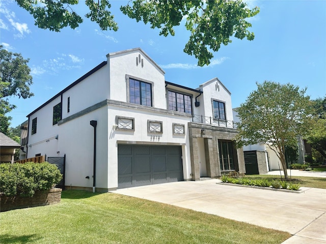 3818 Drake St, Houston, TX 77005 - view of front of home with an attached garage, concrete driveway, a balcony, a front lawn, and stucco siding