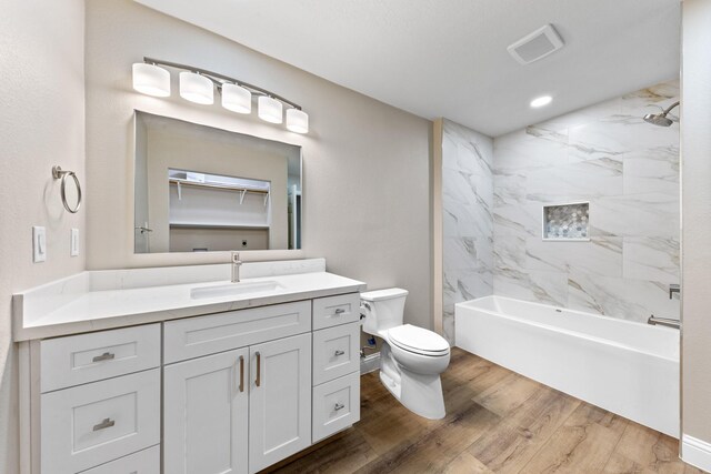 1115 Sunset, Dickinson, TX 77539 - full bathroom featuring vanity, wood finished floors, shower / bathtub combination, and recessed lighting