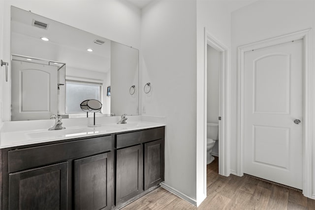 20214 Portbec Dr, New Caney, TX 77357 - full bath featuring double vanity and wood finished floors