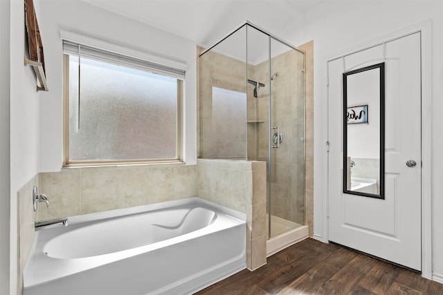 20214 Portbec Dr, New Caney, TX 77357 - full bath featuring a garden tub, a shower stall, and wood finished floors