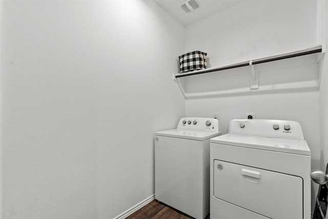 20214 Portbec Dr, New Caney, TX 77357 - washroom with washing machine and clothes dryer and dark wood-style floors
