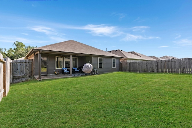 20214 Portbec Dr, New Caney, TX 77357 - back of house featuring a patio area, a fenced backyard, and a shingled roof