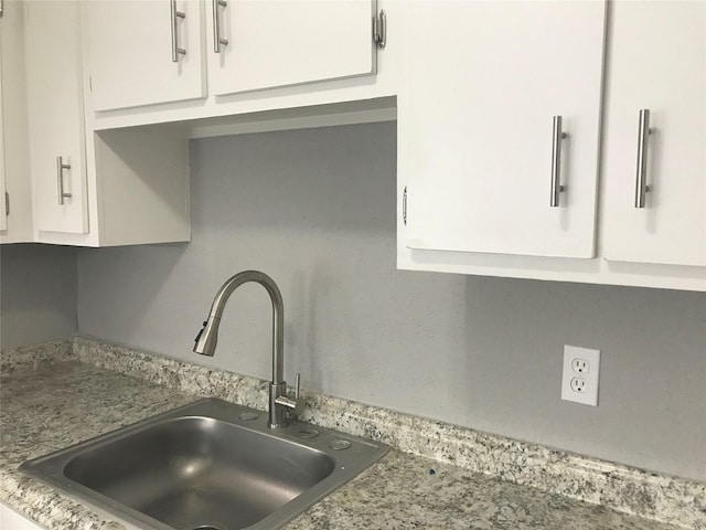 5625 Antoine Dr Unit 903, Houston, TX 77091 - kitchen view of a sink and white cabinetry