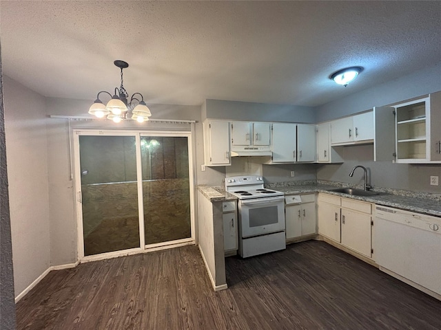 5625 Antoine Dr Unit 903, Houston, TX 77091 - kitchen featuring white appliances, under cabinet range hood, a textured ceiling, dark wood-style flooring, and a chandelier