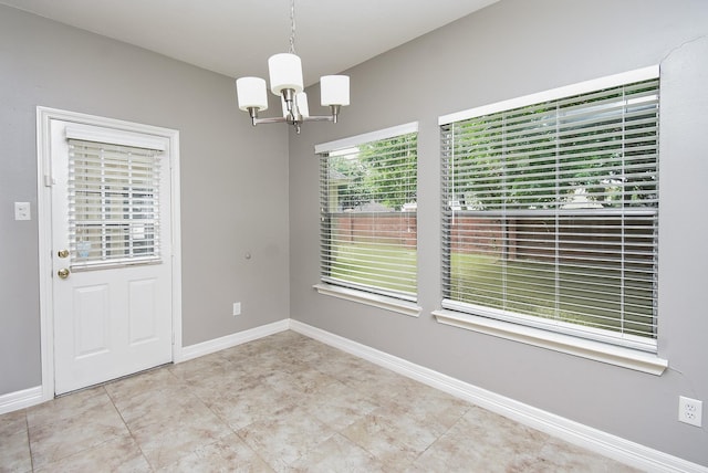 4706 Torrington Ct, Sugar Land, TX 77479 - unfurnished dining area with a chandelier and baseboards
