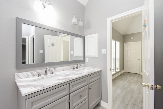 4706 Torrington Ct, Sugar Land, TX 77479 - full bathroom featuring vaulted ceiling and double vanity