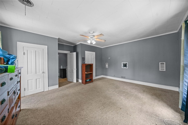 246 W 6th St, Rusk, TX 75785 - carpeted living room featuring ceiling fan and crown molding