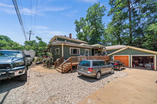 246 W 6th St, Rusk, TX 75785 - view of front of home with a garage and a chimney