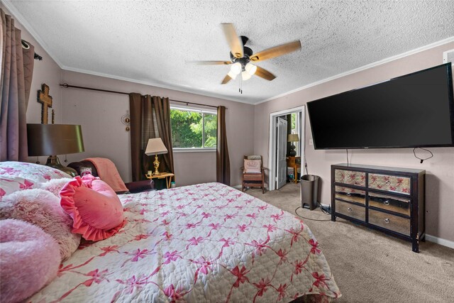 246 W 6th St, Rusk, TX 75785 - carpeted bedroom featuring crown molding, a textured ceiling, and a ceiling fan
