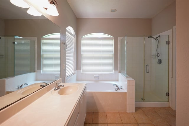 105 N Hollylaurel Cir, The Woodlands, TX 77382 - bathroom with a garden tub, a shower stall, vanity, and tile patterned flooring