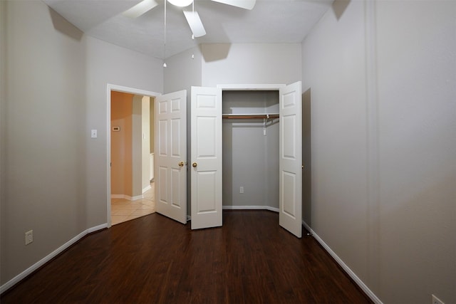 105 N Hollylaurel Cir, The Woodlands, TX 77382 - unfurnished bedroom featuring wood finished floors, a closet, and a ceiling fan