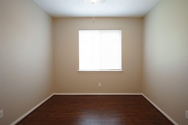 105 N Hollylaurel Cir, The Woodlands, TX 77382 - spare room featuring wood finished floors, plenty of natural light, and a ceiling fan