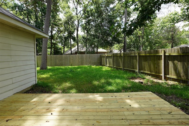 105 N Hollylaurel Cir, The Woodlands, TX 77382 - fenced backyard featuring a deck