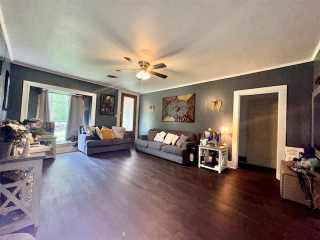 918 E Mcalpine St, Navasota, TX 77868 - living area featuring wood finished floors, ceiling fan, and crown molding