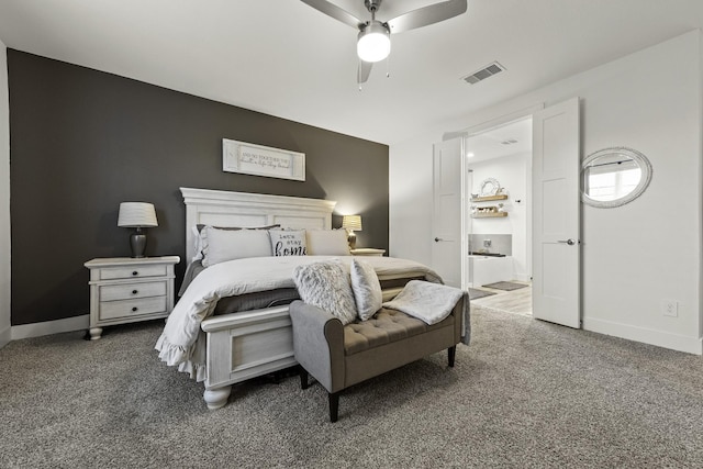 10009 Gray Jay Ct, Conroe, TX 77384 - bedroom with carpet flooring, ensuite bathroom, and ceiling fan