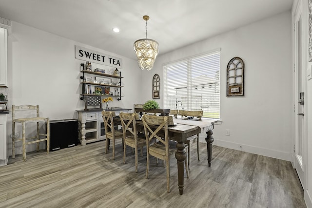 10009 Gray Jay Ct, Conroe, TX 77384 - dining room featuring a chandelier, light wood-type flooring, and recessed lighting