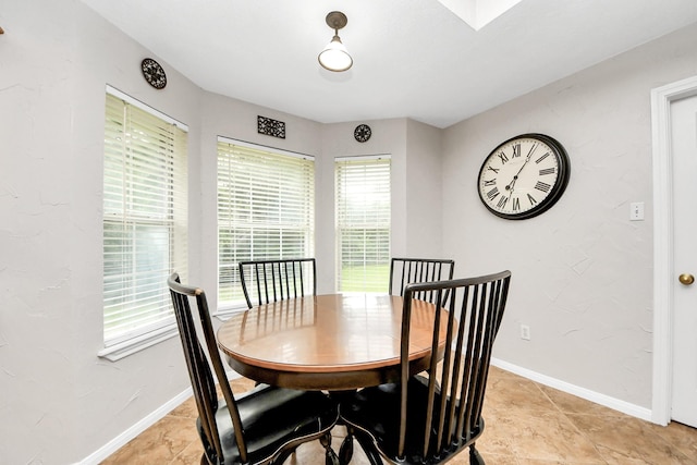 5874 Natchez Trce, Baytown, TX 77523 - dining room featuring baseboards