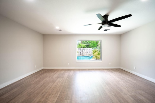 7710 Meadowvale Dr, Houston, TX 77063 - spare room featuring wood finished floors and ceiling fan
