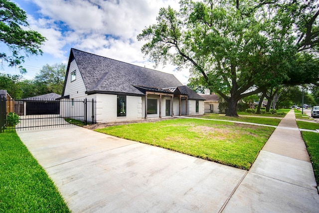 7710 Meadowvale Dr, Houston, TX 77063 - view of front of property with a gate, a shingled roof, a garage, concrete driveway, and brick siding
