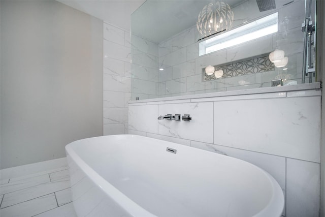 7710 Meadowvale Dr, Houston, TX 77063 - full bath with a freestanding tub and marble finish flooring