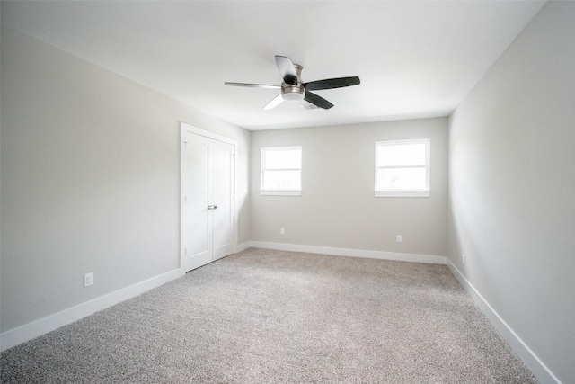 7710 Meadowvale Dr, Houston, TX 77063 - unfurnished bedroom with carpet floors, ceiling fan, and a closet