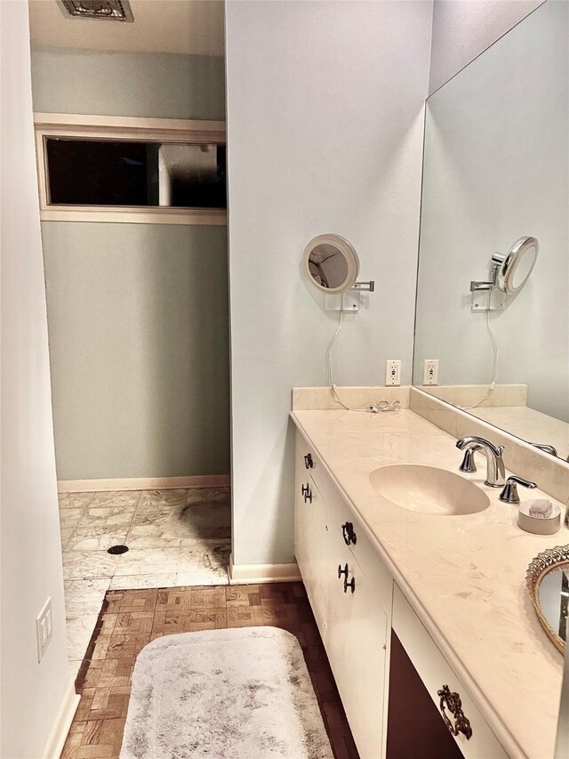 5610 Woodway Dr, Houston, TX 77056 - bathroom with vanity and baseboards