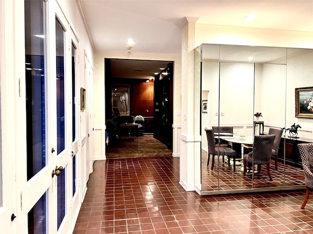 5610 Woodway Dr, Houston, TX 77056 - tiled foyer entrance featuring crown molding, recessed lighting, and a decorative wall