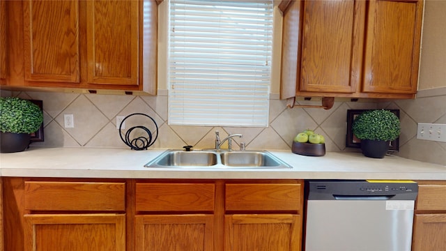 19943 Silver Rock Dr, Katy, TX 77449 - kitchen with dishwasher, light countertops, and tasteful backsplash