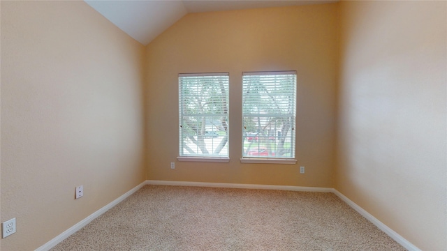 19943 Silver Rock Dr, Katy, TX 77449 - spare room featuring carpet floors and vaulted ceiling