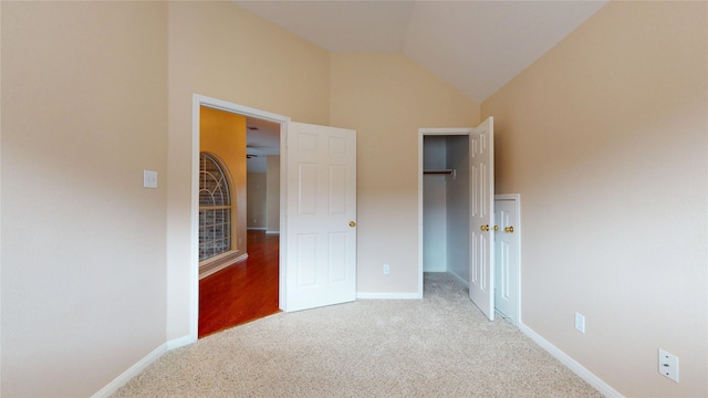 19943 Silver Rock Dr, Katy, TX 77449 - unfurnished bedroom featuring carpet flooring, vaulted ceiling, and a closet