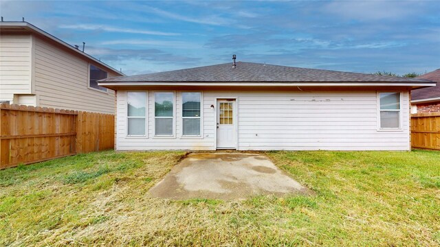 19943 Silver Rock Dr, Katy, TX 77449 - rear view of house featuring a fenced backyard, a patio area, and roof with shingles