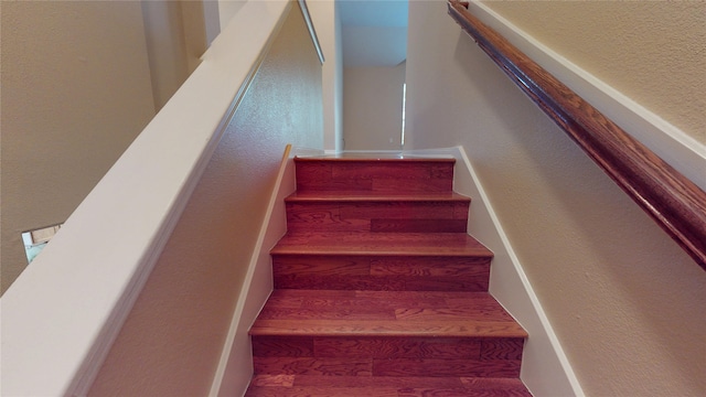 19943 Silver Rock Dr, Katy, TX 77449 - stairs with a textured wall