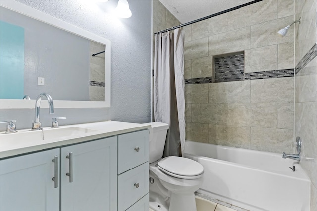 20062 S Pecos Valley Trl, Katy, TX 77449 - bathroom featuring shower / bathtub combination with curtain, vanity, and a textured wall