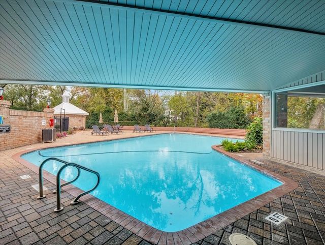 2230 S Piney Point Rd Unit 125, Houston, TX 77063 - community pool featuring a patio area