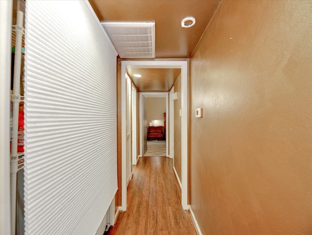 2230 S Piney Point Rd Unit 125, Houston, TX 77063 - hall featuring light wood-type flooring and baseboards