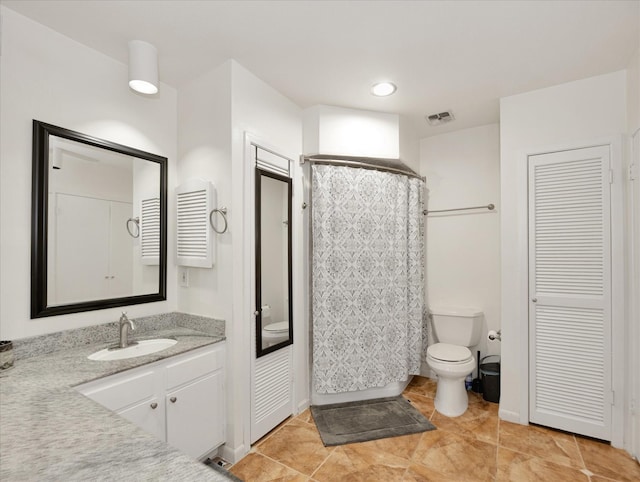 2230 S Piney Point Rd Unit 125, Houston, TX 77063 - full bathroom featuring a closet, vanity, and tile patterned flooring