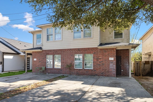 4340 Phlox St A/B, Unit A/B Houston, TX 77051 - traditional home featuring brick siding and a patio area