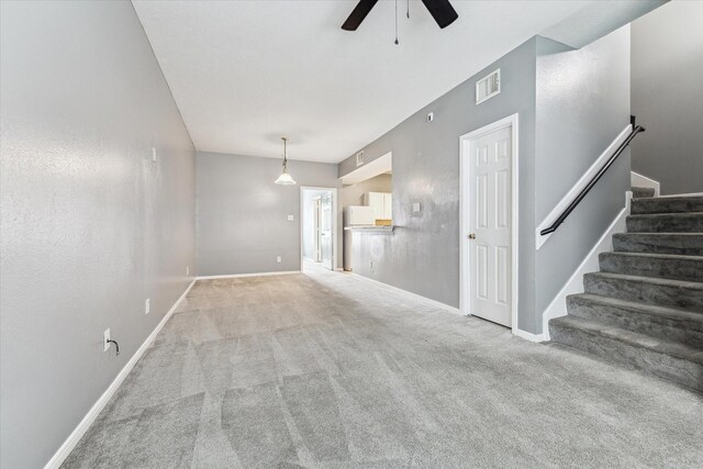 4340 Phlox St A/B, Unit A/B Houston, TX 77051 - unfurnished living room with carpet, a ceiling fan, and stairs
