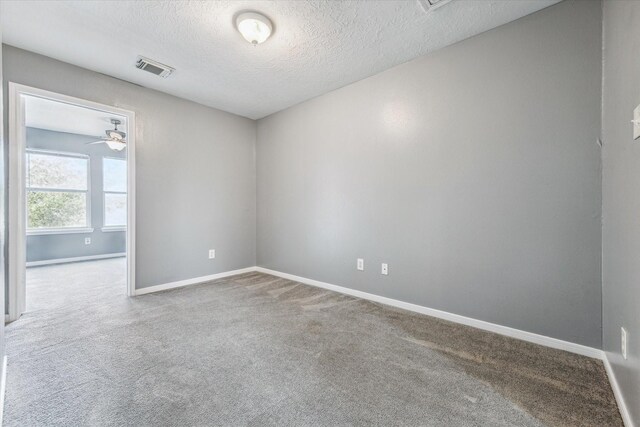 4340 Phlox St A/B, Unit A/B Houston, TX 77051 - empty room featuring carpet flooring and a textured ceiling