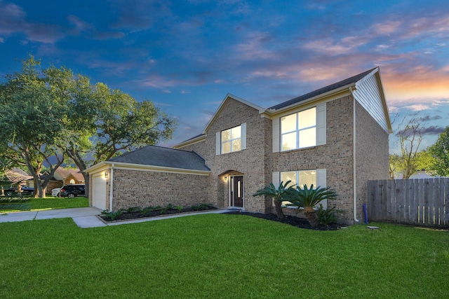 4211 Royal Manor Dr, Pasadena, TX 77505 - traditional-style house with an attached garage, driveway, and brick siding