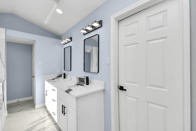 4211 Royal Manor Dr, Pasadena, TX 77505 - bathroom featuring double vanity, marble finish floors, vaulted ceiling, and recessed lighting