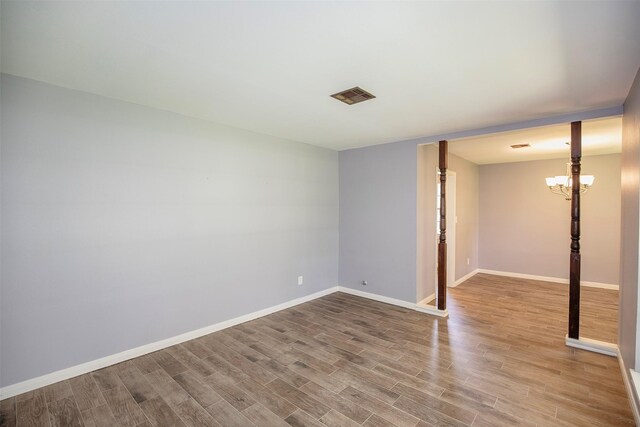 13329 24th St, Santa Fe, TX 77510 - empty room with wood finished floors