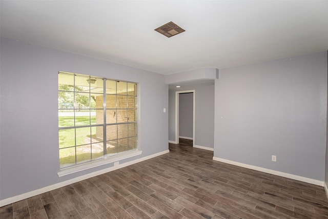 13329 24th St, Santa Fe, TX 77510 - spare room featuring dark wood-style flooring