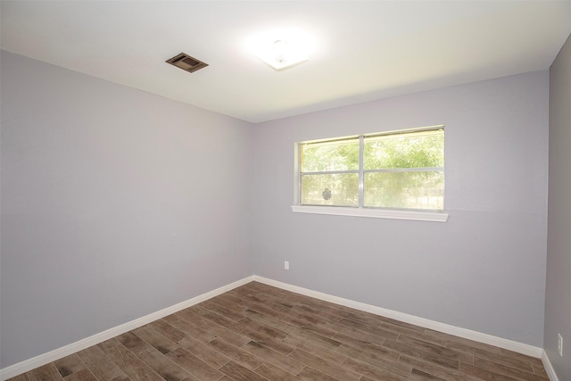 13329 24th St, Santa Fe, TX 77510 - empty room featuring dark wood finished floors