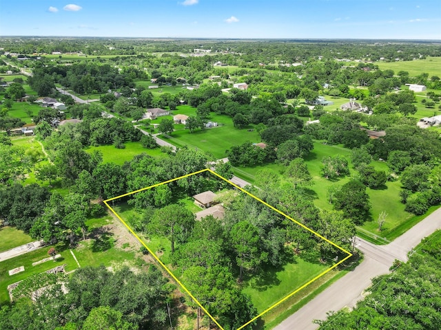 13329 24th St, Santa Fe, TX 77510 - view of property location with property boundaries highlighted and a tree filled landscape