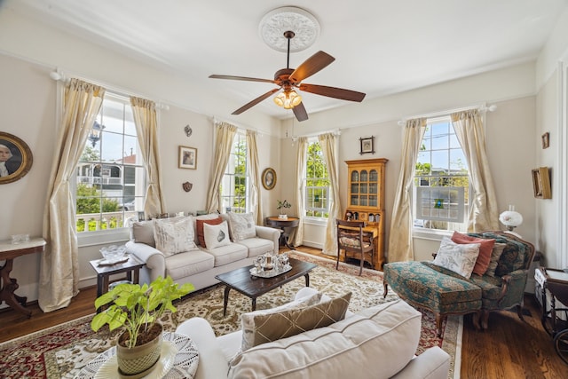 607 11th St, Galveston, TX 77550 - living room featuring wood finished floors and ceiling fan