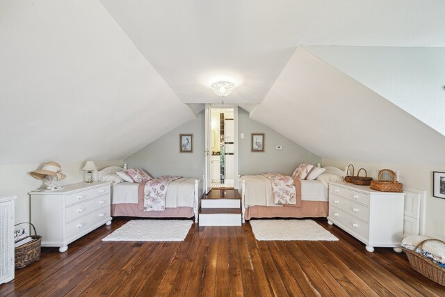 607 11th St, Galveston, TX 77550 - bedroom featuring hardwood / wood-style flooring and lofted ceiling